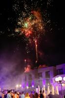 a crowd of people standing in front of a building with fireworks at Hotel Ritual Torremolinos- Adults Only in Torremolinos