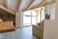 A seating area at La Giostra Home Apartments