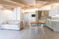 A kitchen or kitchenette at La Giostra Home Apartments