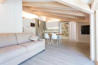 A seating area at La Giostra Home Apartments