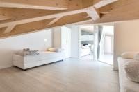 A seating area at La Giostra Home Apartments