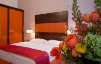Postel nebo postele na pokoji v ubytování Appartement-Hotel an der Riemergasse