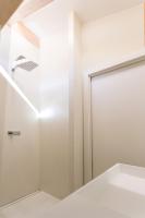 A bed or beds in a room at La Giostra Home Apartments