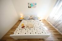 Posteľ alebo postele v izbe v ubytovaní Apartman Dendo
