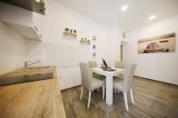 Kuchyňa alebo kuchynka v ubytovaní Apartman Dendo