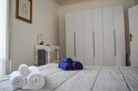 A bed or beds in a room at Sofia Pretty Appartament