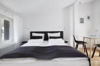 Postel nebo postele na pokoji v ubytování St Agnes Apartments Attic