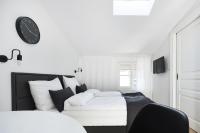 Postel nebo postele na pokoji v ubytování St Agnes Apartments Attic
