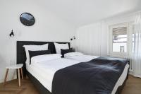 Postel nebo postele na pokoji v ubytování St Agnes Apartments Attic