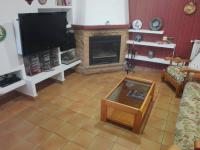 TV a/nebo společenská místnost v ubytování Villa Gómez