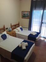 Postel nebo postele na pokoji v ubytování Villa Gómez