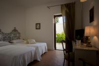 Posteľ alebo postele v izbe v ubytovaní Hotel Terranobile Metaresort