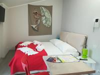 Posteľ alebo postele v izbe v ubytovaní Re Lear Apartments - Sottoriva dream