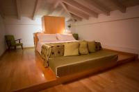 Posteľ alebo postele v izbe v ubytovaní Hotel Terranobile Metaresort