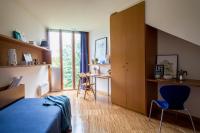 A bed or beds in a room at Residencia Universitaria Resa O Castro