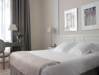 Postel nebo postele na pokoji v ubytování Hotel Villa Rosario, Palacete