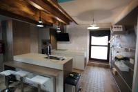 A kitchen or kitchenette at Gaubeako Ekhia