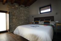 A bed or beds in a room at Gaubeako Ekhia