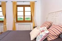 Łóżko lub łóżka w pokoju w obiekcie Casa Valerie