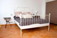 Łóżko lub łóżka w pokoju w obiekcie Casa Valerie