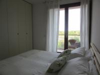 Łóżko lub łóżka w pokoju w obiekcie Venezia nature&beach