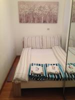 Posteľ alebo postele v izbe v ubytovaní Apartman Allegria
