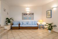 A seating area at Apartment in S'Abba e Sa Pedra with pool