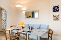 A seating area at Apartment in S'Abba e Sa Pedra with pool