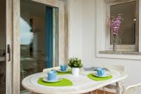 A balcony or terrace at Apartment in S'Abba e Sa Pedra with pool