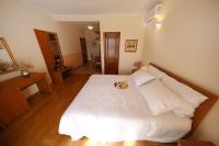 Posteľ alebo postele v izbe v ubytovaní Apartments Villa Marnii