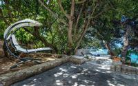 Vonkajšia záhrada v ubytovaní Pine Beach Villa