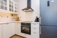 Kuchyň nebo kuchyňský kout v ubytování Apartments Fontana