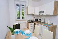 Kuchyňa alebo kuchynka v ubytovaní Apartments Garden Residence Opatija