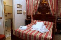 Posteľ alebo postele v izbe v ubytovaní Sitges Royal Rooms
