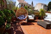 Vonkajšia záhrada v ubytovaní Sitges Royal Rooms