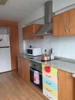 Kuchyň nebo kuchyňský kout v ubytování Lindo y acogedor Apartamento Grao Playa Gandia piso 5to sin ascensor