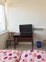 A television and/or entertainment centre at Šariš rooms