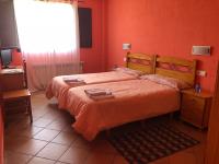 A bed or beds in a room at Hotel CTR San Baudelio