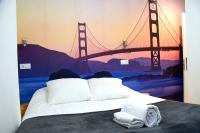 A bed or beds in a room at Maite Urban Dreams