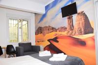 A television and/or entertainment centre at Maite Urban Dreams