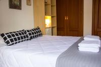 A bed or beds in a room at En el corazón de Sevilla junto a la Giralda WIFI