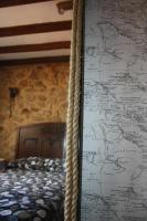 Postel nebo postele na pokoji v ubytování Casa Rural El Palatino
