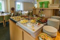 a buffet with many different types of food on a table at Pension Maiglöckchen in Karlshagen