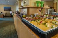 a buffet line with many different types of food at Pension Maiglöckchen in Karlshagen