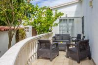 Posedenie v ubytovaní Empurialola -Encantadora Casa con jardin cerca del centro -142