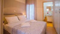 Posteľ alebo postele v izbe v ubytovaní Maribella Residence Old Town Rethymno