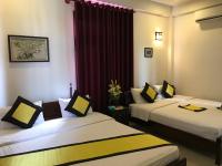 Quynh Chau Homestay Hội Anにあるベッド