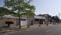 a building on the side of a street at Atlantic Motel in Point Pleasant Beach