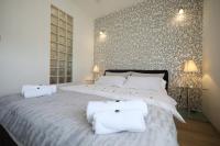 Posteľ alebo postele v izbe v ubytovaní Top Apartments Zadar