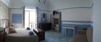 A bed or beds in a room at Casa Carmela